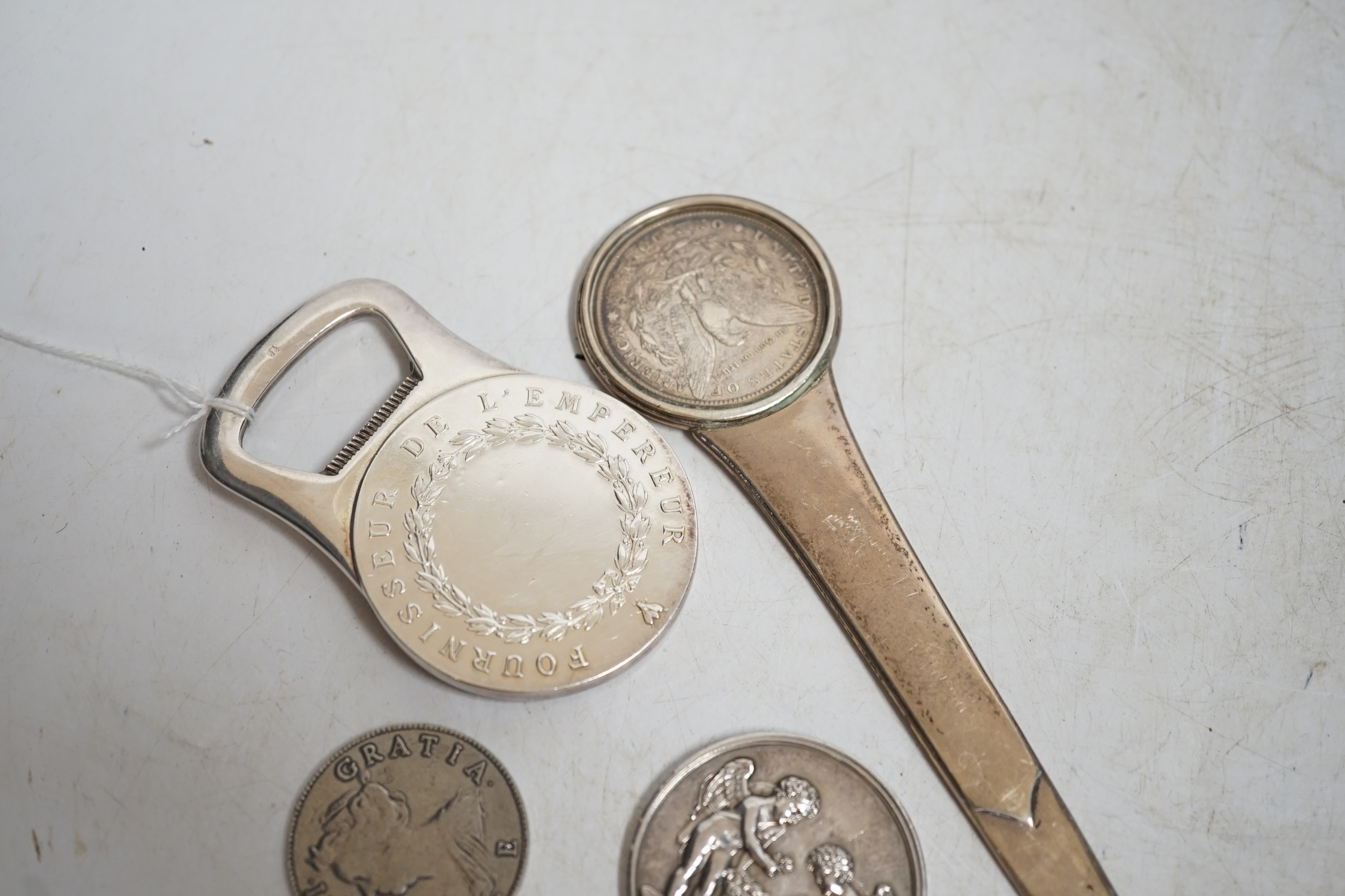 A group of mostly silver coins and a Cristofle silver plated bottle opener. Condition - fair